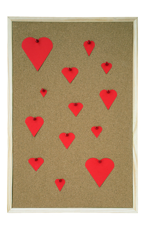 Pinboard with several hearts in different sizesの写真素材