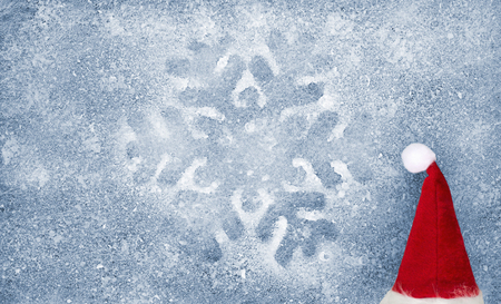 Christmas hat, snowflake, grey fiber fabric and blue glitter film, backgroundの写真素材
