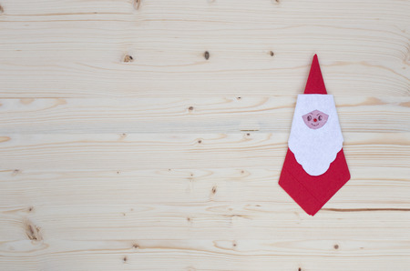 Santa claus serviette on wood, spruce, firの写真素材