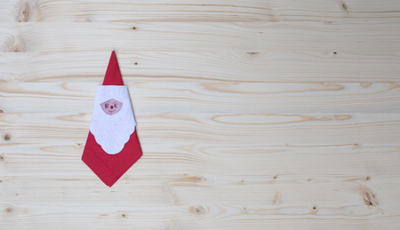 Santa claus serviette on wood, spruce, fir, backgroundの写真素材
