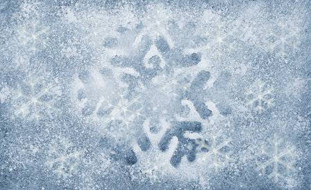 Several dark and light blue snowflakes, cold winter backgroundの写真素材