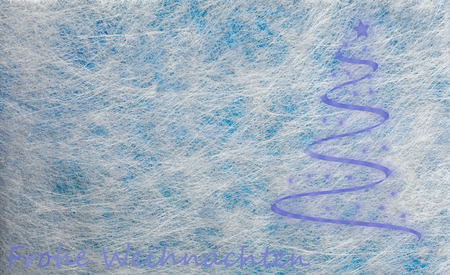 Grey fiber fabric and blue glitter film and modern christmas tree and the german words for Merry Christmas (Frohe Weihnachten), backgroundの写真素材