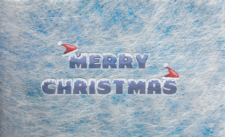 Grey fiber fabric and blue glitter film and the words Merry Christmas, backgroundの写真素材