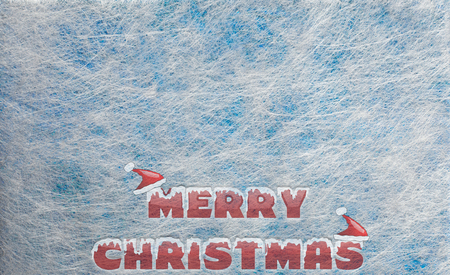 Grey fiber fabric and blue glitter film and the words Merry Christmas, backgroundの写真素材