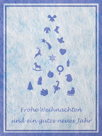 Abstract christmas tree with various christmas motifs and the german word for Merry Christmas and a happy New Yearの写真素材