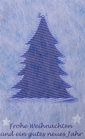 Abstract christmas tree and the german words for Merry Christmas and a Happy New Year, christmas cardの写真素材