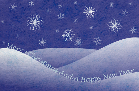 Winter scene with snowy mountains and snowflakes and the words Merry Christmas And A Happy New Year, christmas cardの写真素材