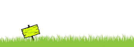 Grass and wooden sign with the german words for Happy Easterの写真素材