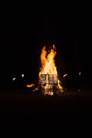 Embers fire fireplace grill fire flame, black backgroundの写真素材