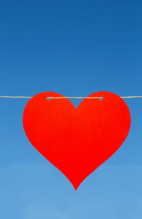 Heart of paper on a cordの写真素材