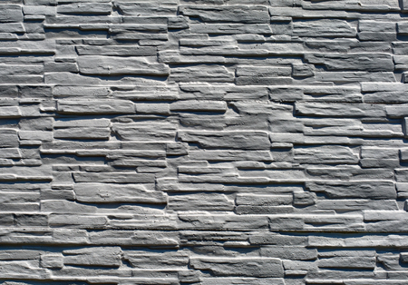 stone brick wall detail close up backgroundの写真素材