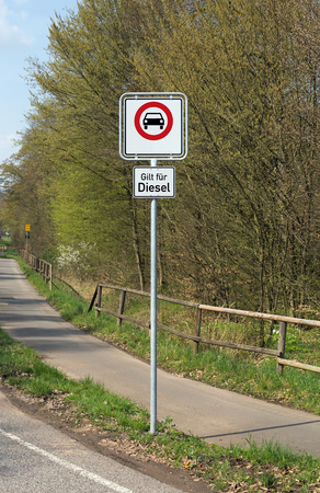 German traffic sign  for diesel driving prohibited with german text for applies to diesel, isolated on whiteの写真素材