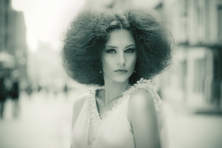 Stylized retro fashion portrait of a beautiful womanの写真素材