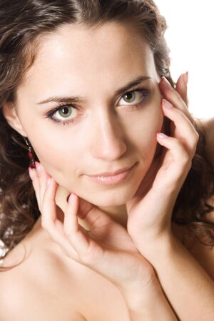 Close-up studio portrait of a beautiful young sexy woman, isolated on white backgroundの写真素材