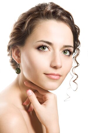 Studio portrait of a beautiful brunette womanの写真素材