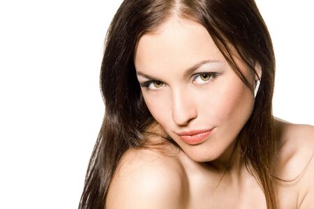 Closeup of beautiful young woman face. Isolated on white background.の写真素材