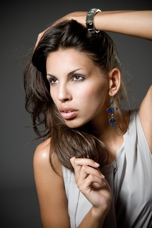 Closeup studio portrait of a beautiful young arabic womanの写真素材