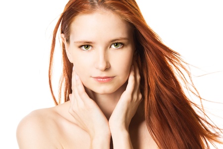 Close-up studio portrait of a sexy young woman with beautiful eyes, isolated on white backgroundの写真素材
