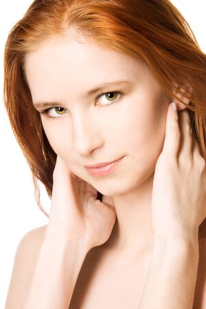 Close-up studio portrait of a sexy young woman with beautiful eyes, isolated on white backgroundの写真素材