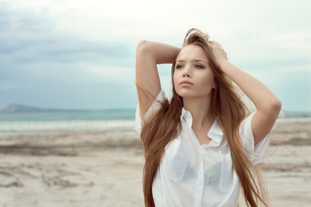 Beautiful girl in a desertの写真素材