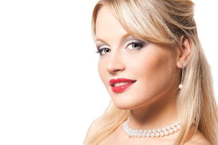 Close-up of beautiful young woman face. Isolated on white background.の写真素材