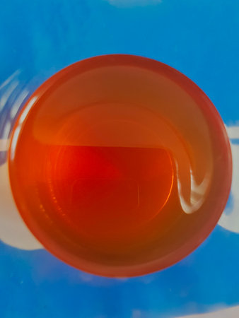Close-up shot of tea cup from above.