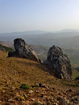 From the 1,385 m summit of Mount Ajlajel at Koudiet Ajlajel near Tetouan, Morocco, sunset spills...