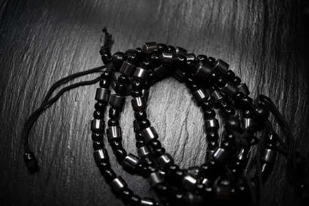handmade black beaded bracelet,photo art. creative photographyの写真素材