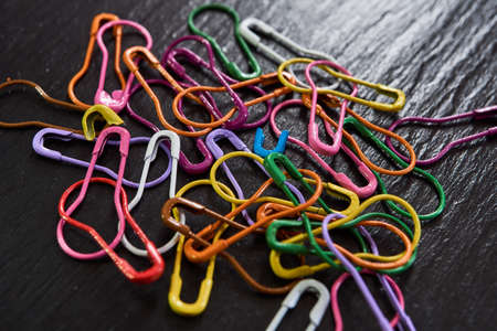 collection of metal pins of various colors,photo art. creative photographyの写真素材