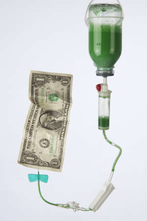 A drip inserted into a dollar bill