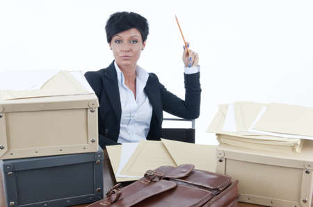 Stressed businesswoman sitting at her desk