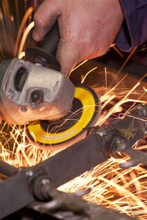 Grinding wheel cutting the iron making a lot of Sparks