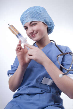 Doctor happy to get an injection seems crazyの写真素材