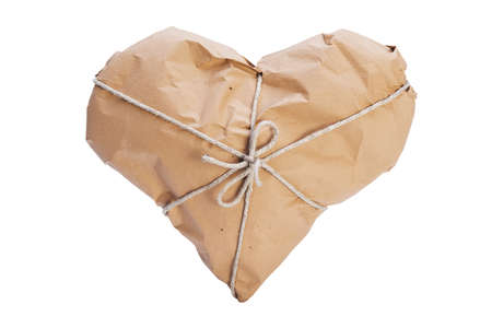Heart wrapped with brown paper and stringの写真素材