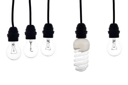 A light bulb with low consumption between light bulbs tungsten on white background