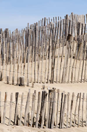 Fences on the beach Espiguette in Camargue Franceの写真素材