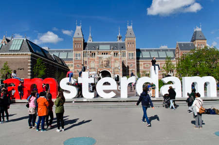 Amsterdam, Holland - May 7, 2016: People in front of the writing, I amsterdam, at Museumplein, Rijksmuseumのeditorial素材