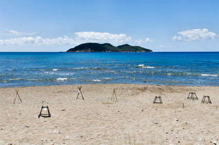 Island of Zakynthos Greece, National Marine Park, Dafni beach, Caretta turtle nest protection, on the bottom, the Pelouzo islandの写真素材