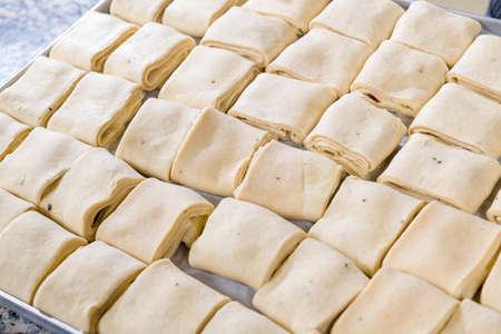 Stages of preparation, pastry chef prepares chocolate brioche in pastry shopの写真素材