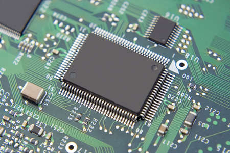 A shot of a new computer mother board.  This image is a nice background image for print material...