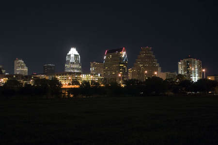 A very pretty night in Austin, Texas.  This shot was taken from across Town Lake downtown.  A very useful image for Austin related content.の写真素材