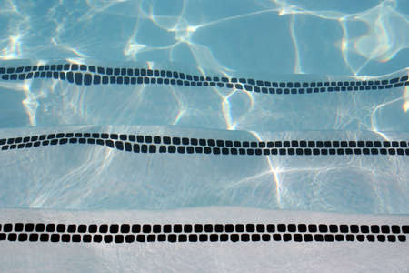 Steps going down into a pool.の写真素材