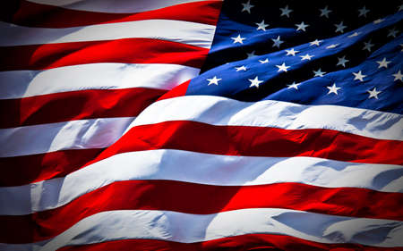 an american flag boldly flying in the wind