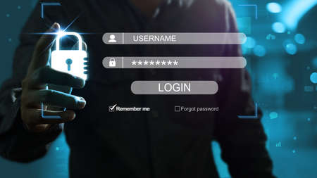 Man's hand presses the padlock and takes the body to protect information from being lost or stolen...