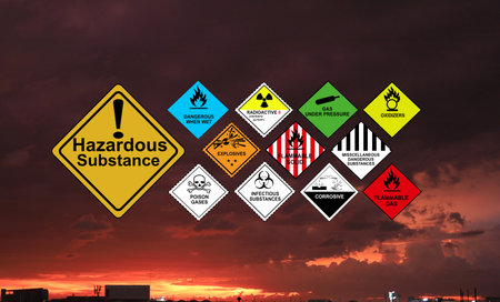 Hazardous Substance or dangerous Warning Sign and red sky background conveys the damage of the environment and the fear of harm to living life.の写真素材