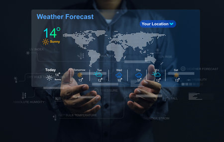 The user's hand check the weather forecast on screen checking the weather during the day, such as temperature, wet dry bulb absulute humidity, relative, atmospheric pressure, UV index and rain fall.の写真素材