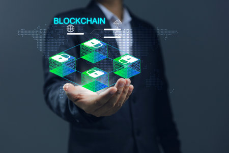 Blockchain technology concept with businessman and encrypted blocks. business man hand holding block chain technology with online multi media binary codeの写真素材