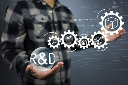 Creative developer holding R and D ball on research and development and gear icons as a continuous...