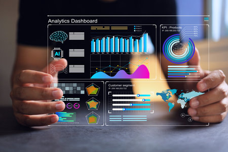 Data scientist working on virtual screen with business dash board analytics chart metrics KPI to analyze the performance and create insign reports of business management. Data science concept.の写真素材