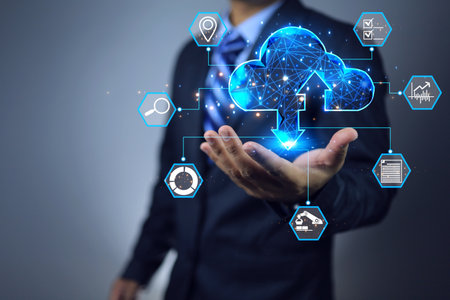 Businessman use his hand to receive data from the cloud represent to upload and download data to use...